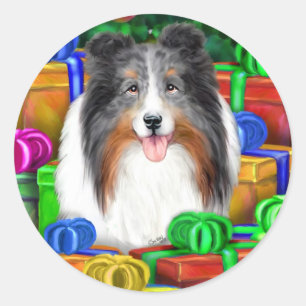 Pegatina Redonda Sheltie Navidades abren regalos azul Merle