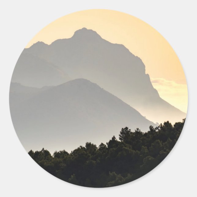 Pegatina Redonda Silhouettes de las montañas (Anverso)