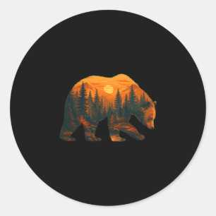 Pegatina Redonda Silueta de oso masculino con paisaje forestal y