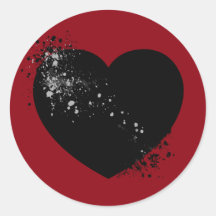 Tinta salpicada de corazón negro.