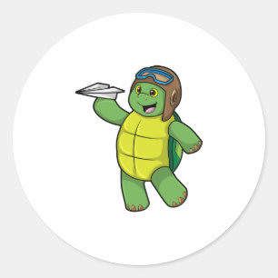 Pegatina Redonda Tortuga como piloto con plano de papel
