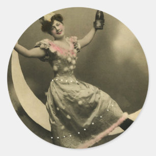 Pegatina Redonda Tosta de champagne en una luna creciente