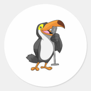 Pegatina Redonda Toucan en la música con micrófono