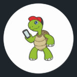 Pegatina Redonda Turtle with Phone & Hat<br><div class="desc">This design is the perfect gift for a birthday,  Christmas and other celebrations. It is suitable for women,  men and kids.</div>