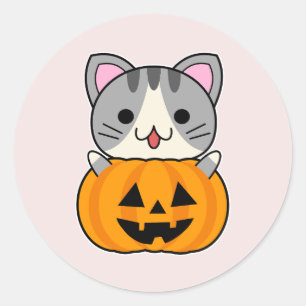 Pegatina Redonda Un gato lindo de Halloween en Jack o Lantern