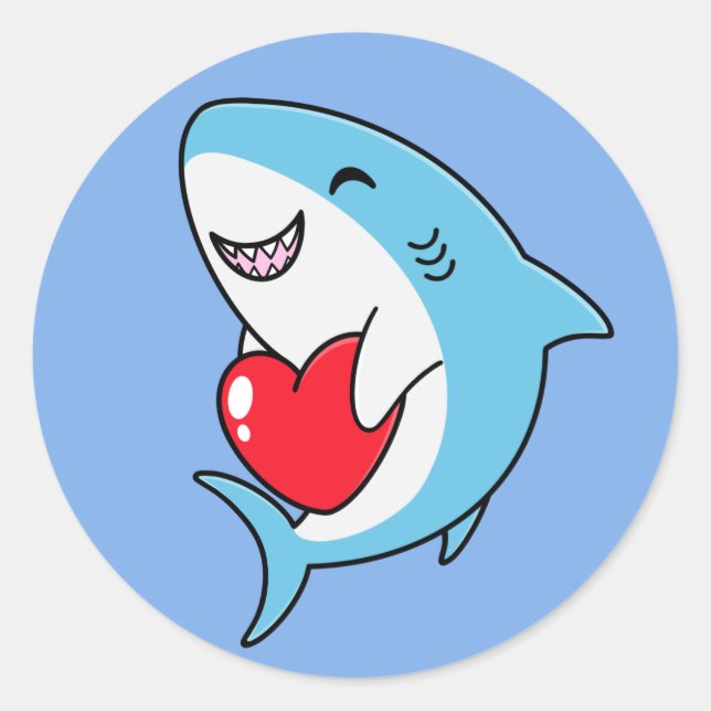 Pegatina Redonda Un lindo tiburón azul feliz con un corazón rojo (Anverso)