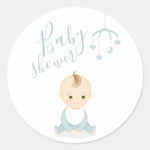 Pegatina Redonda Un niño pequeño y su Baby Shower móvil