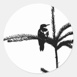 Pegatina Redonda Un pájaro en una rama