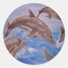 Pegatina Redonda Un pote de delfines juguetones