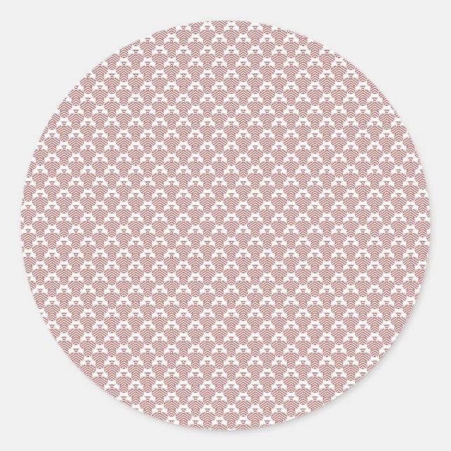 Pegatina Redonda Una alfombra con motivos rojos y marrones está sob (Anverso)