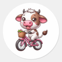 Vaca marrón y blanca montando una bicicleta
