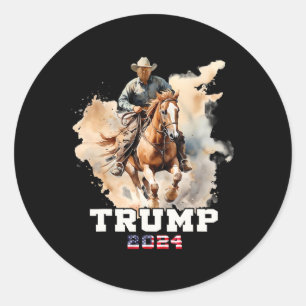 Pegatina Redonda Vaquero con bandera norteamericana montando a caba