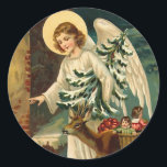 Pegatina Redonda Vintage Christmas Angel con venado<br><div class="desc">Navidades de estilo vintage Ángel cargando un árbol de Navidad y un reno entregando regalos festivos y manzanas a los Navidades incluso</div>
