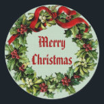 Pegatina Redonda Vintage Christmas Holly Wreath con Red Ribbon V03<br><div class="desc">Esta corona vintage de Navidad Holly Wreath con cinta roja es una adición dulce a tus tarjetas de vacaciones y regalos de Navidad.</div>