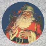 Pegatina Redonda Vintage Christmas, Jolly Santa Claus con juguetes<br><div class="desc">Ilustracion de época Feliz Navidad diseño con un feliz y alegre Santa Claus con una larga barba blanca y un gorra cargando un saco lleno de juguetes en la Noche de los Navidades.</div>