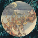 Pegatina Redonda Vintage Christmas Santa Claus Sleigh with Reindeer<br><div class="desc">Vintage illustration Victorian Merry Christmas holiday scene featuring Santa Claus and his reindeer delivering toys on Christmas Eve. Santa is flying over the snow on a chilly winter night with a full moon in the sky.</div>