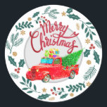 Pegatina Redonda Vintage Red Truck Merry Christmas<br><div class="desc">Camión Rojo Vintage Feliz Navidad a pegatinas con regalos y árbol navideño. Un pegatina de estilo vintage festivo para tarjetas de felicitación o paquetes de regalo,  rodeado de vegetación.</div>