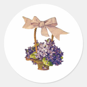 Pegatina Redonda Violetas de época en una canasta