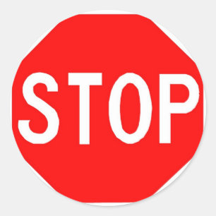 Pegatina redondeado con el signo Stop.