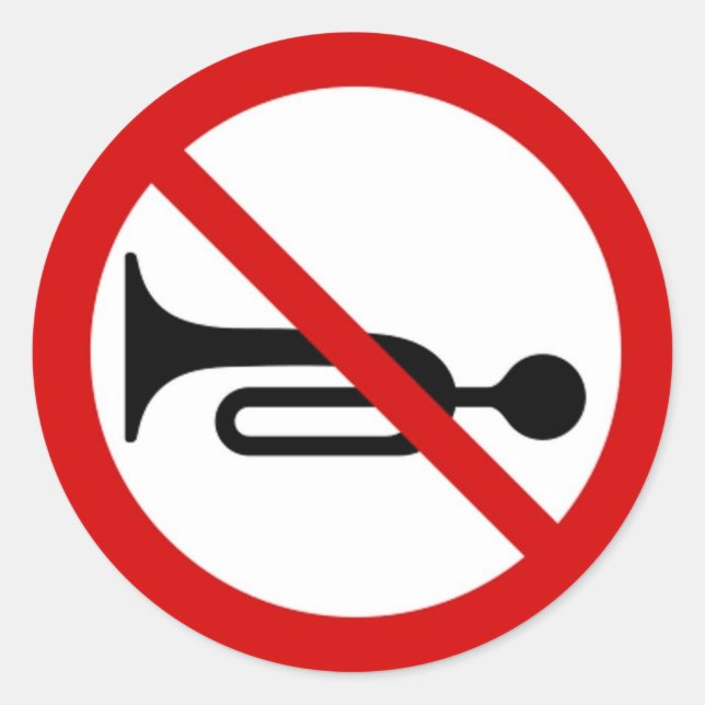 Pegatina redondo con un signo de cuerno prohibido. (Anverso)