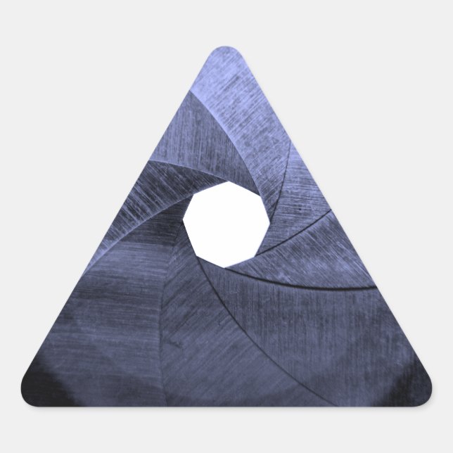 Pegatina Triangular aspas de apertura de lente (Anverso)