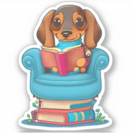 Pegatina Un cachorro de Dachsund leyendo un libro