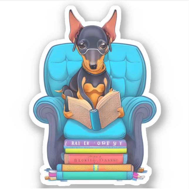 Pegatina Un cachorro Doberman leyendo un libro (Anverso)
