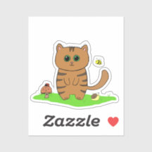 Un gato lindo Naranja a rayas en el prado verde