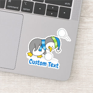 Pegatina Un pingüino con nieve