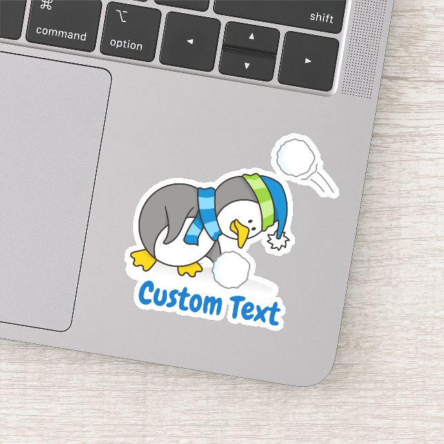 Pegatina Un pingüino con nieve (Detalle)