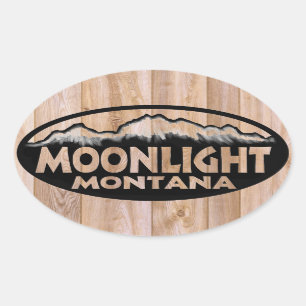 Pegatinas ovales de madera de Montana a la luz de