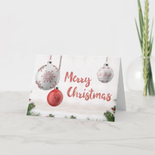 Pelota blanca y dorada con nieve Feliz Navidad