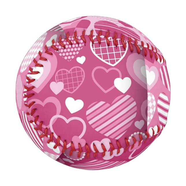 Pelota De Béisbol Patrón cardíaco (A vibrant pink baseball adorned with various heart patterns in a bright cheerful setting.)