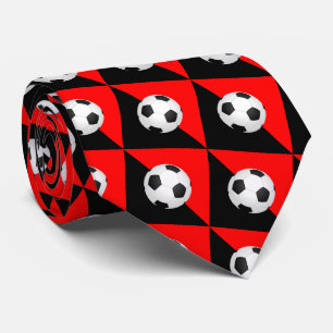 Pelota de fútbol con corbata de cuello rojo y negr