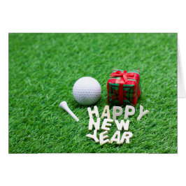 Pelota de golf con feliz Año Nuevo en hierba verde
