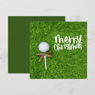 Pelota de golf con tee de Navidad para el día fest