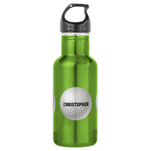 Pelota de golf en la botella de agua verde