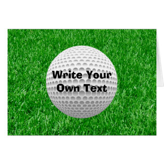 Pelota de golf y césped