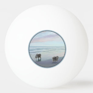 Pelota De Ping Pong Manos en la pintura de perro en la costa
