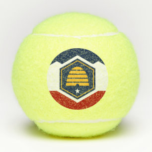 Pelota de tenis Penn con la nueva bandera del esta