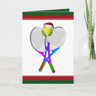 Pelota de tenis y raquetas de Navidad