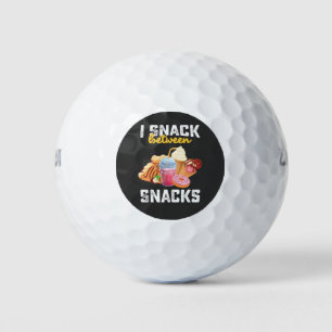 Pelotas De Golf Atrapé Entre Aperitivos De Comida Dulce Amantes