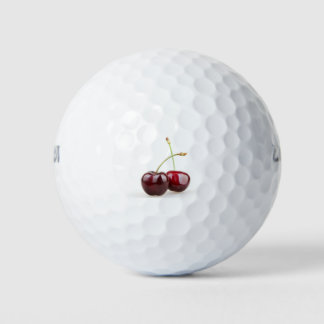 Pelotas De Golf Dos cerezos dulces aislados en grupo blanco