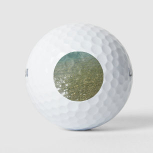 Pelotas De Golf El agua en la playa resumen la fotografía de la na