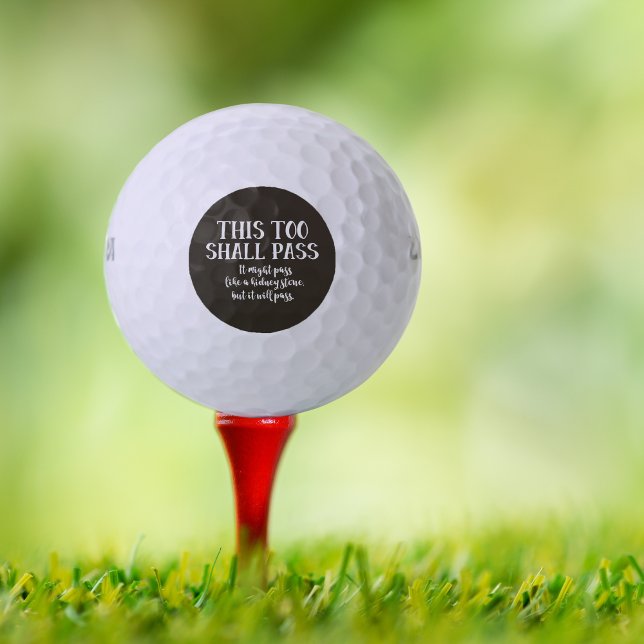 Pelotas De Golf Es gracioso que esto también pasará como piedra de (Golf ball on red tee.)