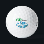 Pelotas De Golf Funny Golf Balls 60 cumpleaños<br><div class="desc">Celebra el 70 cumpleaños de un golfista con estilo con la edición de cumpleaños 70 de Funny Golf Balls. Estas pelotas de golf hacen un regalo divertido y único para cualquier aficionado al golf que llegue a esta edad de hitos. Con la divertida inscripción "¡70 años y todavía balancín!" estas...</div>