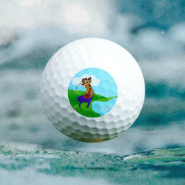 Pelotas De Golf Golfer femenina conduce sobre el peligro del agua