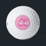 Pelotas De Golf Iniciales de monograma de nombre rosado<br><div class="desc">Fondo rosado,  texto rosa caliente y blanco. Personalice y agregue sus iniciales y nombre de monograma. El nombre está escrito con una escritura de estilo con letras a mano moderna.</div>