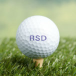 Pelotas De Golf Iniciales de monograma púrpura personalizadas<br><div class="desc">Las pelotas de golf personalizados hacen grandes regalos para todas las ocasiones. Este diseño presenta un texto de bloque morado de estilo monograma. Puede personalizar del texto con cualquier rúbrica o texto de su elección. #golflover</div>