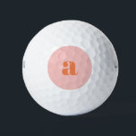 Pelotas De Golf Letras retro monograma de Naranja rosado cúbito pa<br><div class="desc">Estas elegantes bolas de golf cuentan con su monograma en coral sobre un fondo rosa pastel con letras retro. ¡Buena idea de regalo!</div>